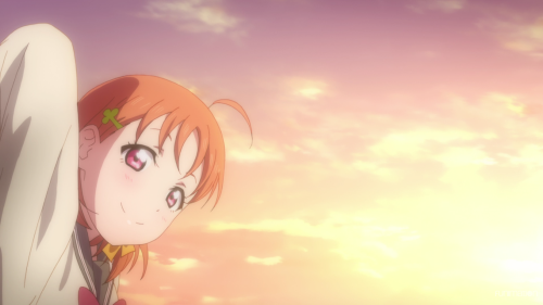 Love Live! Sunshine!! / Episode 1 / Chika smiling with the sun in the background